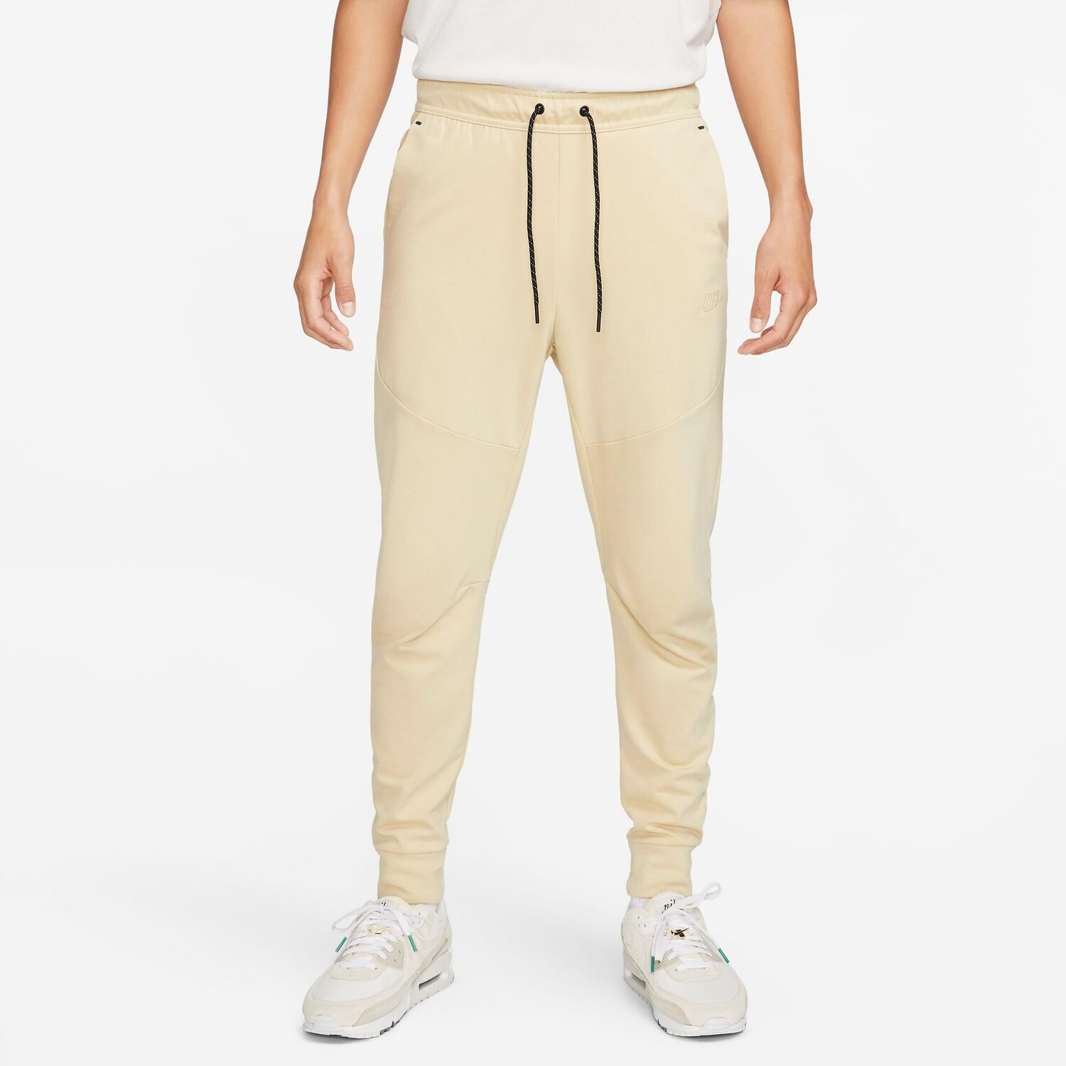 

Мужские легкие флисовые спортивные штаны для бега узкого кроя Nike Sportswear Tech Essentials, желтый
