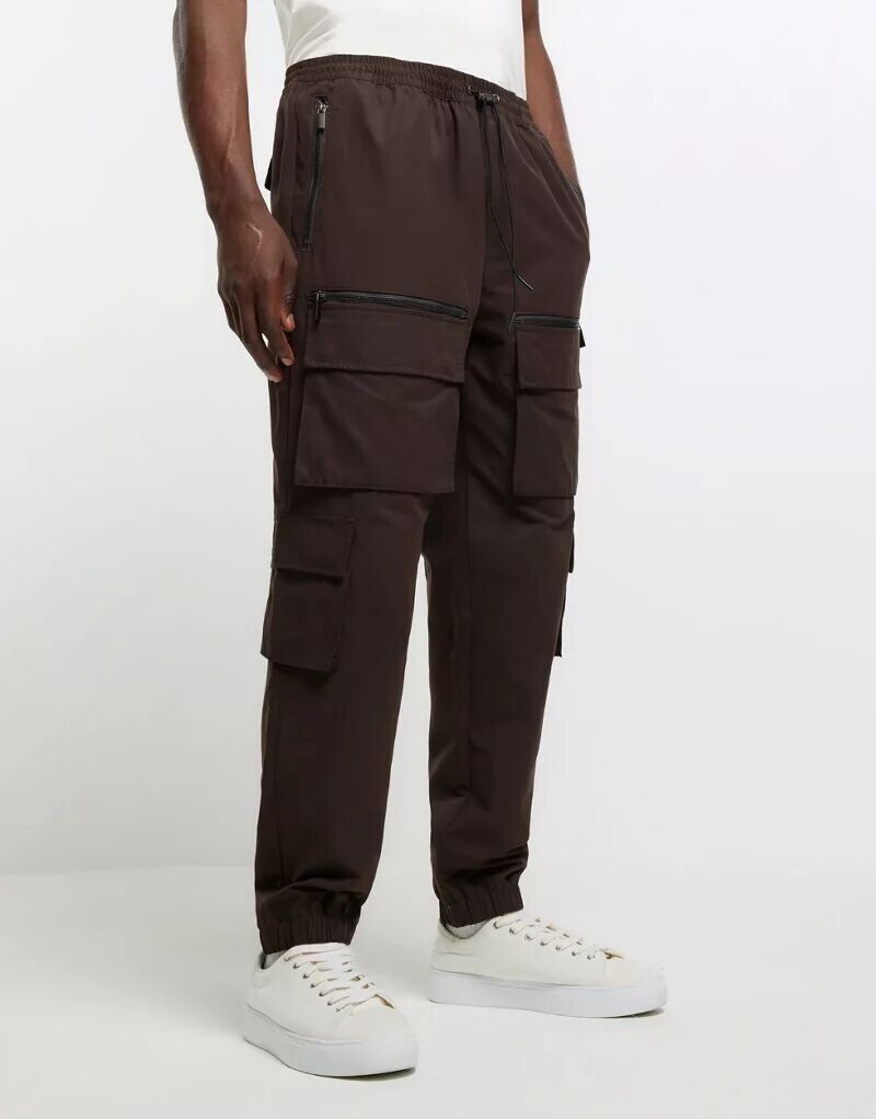 

Коричневые брюки карго с множеством карманов River Island