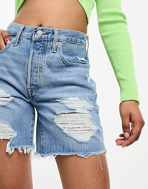 

Голубые джинсовые шорты Levi's 501 с потертостями