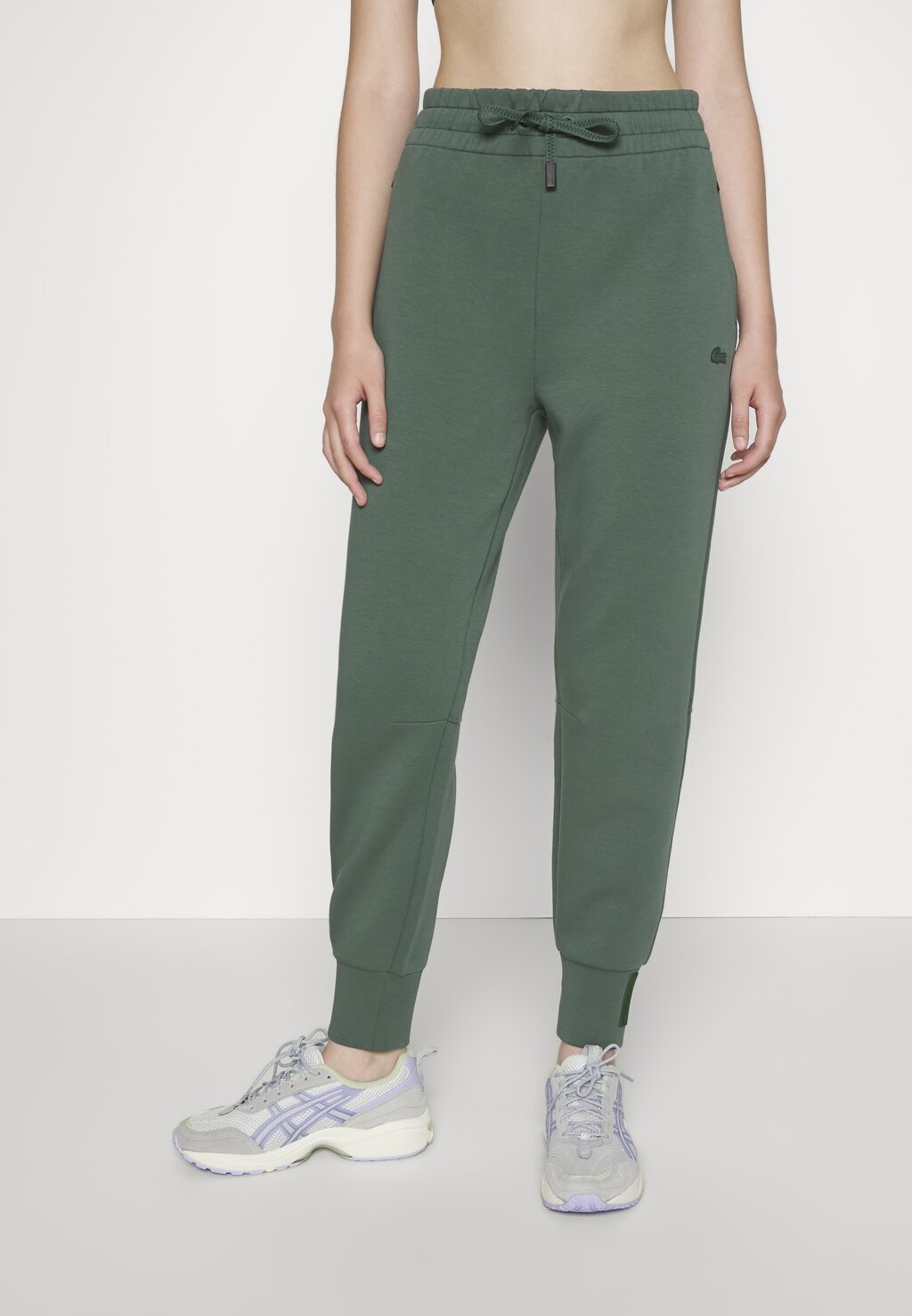 

Низ спортивного костюма Lacoste