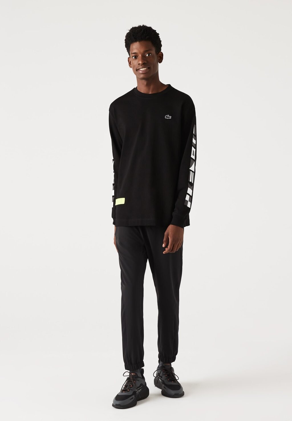 

Спортивные брюки Lacoste