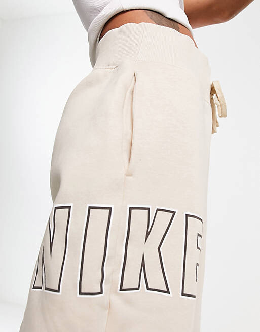 

Бежевые джоггеры Nike Varsity Oversity