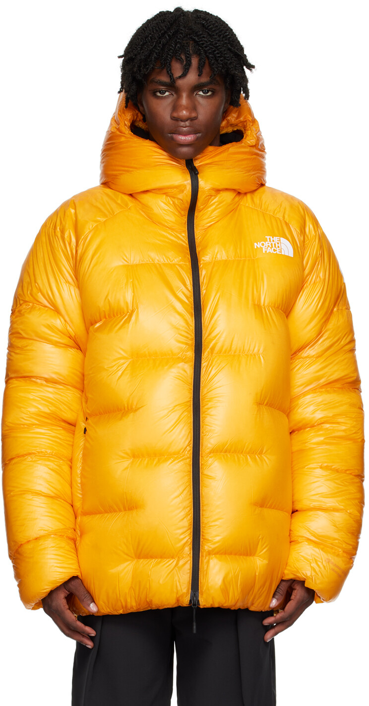 

Желтый пуховик The North Face Pumori