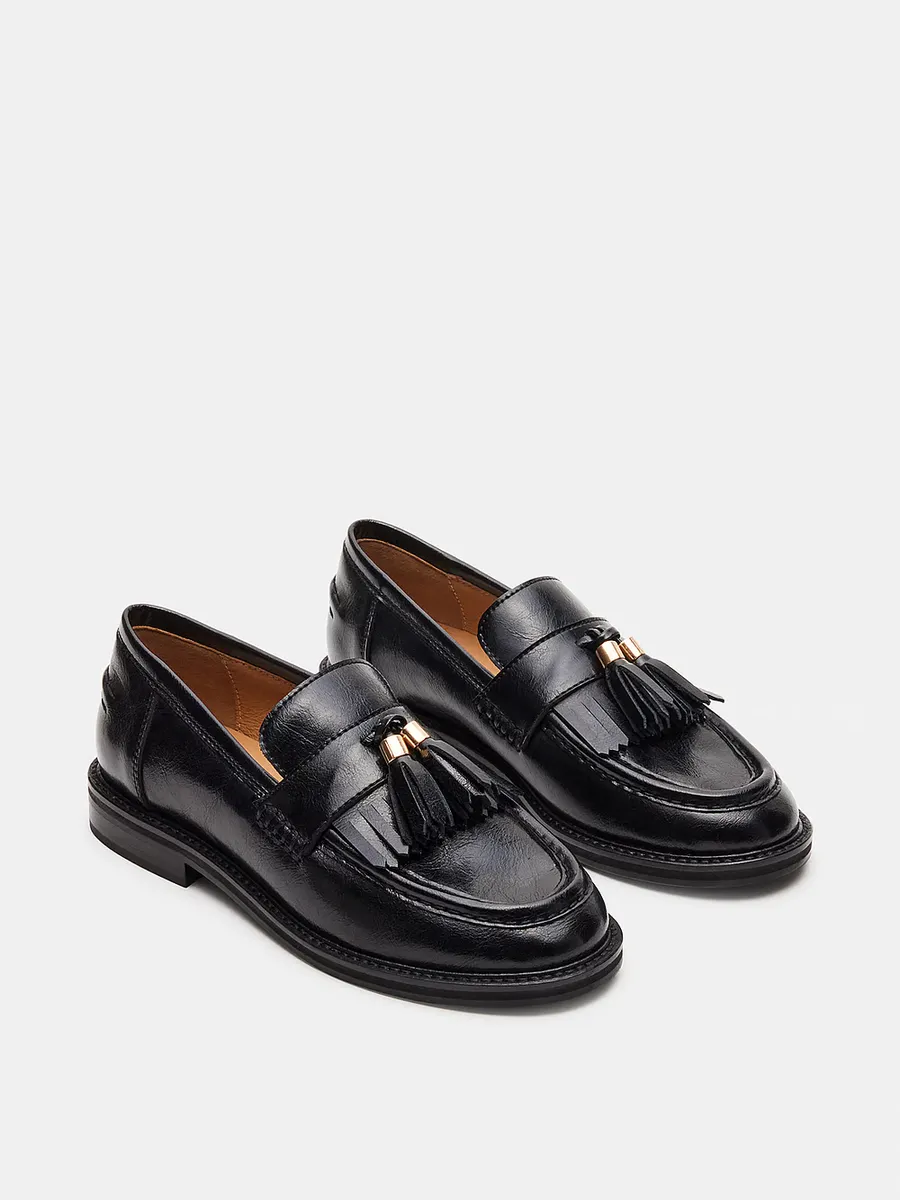 

Черные кожаные лоферы Radcliff с кисточками Steve Madden, черный