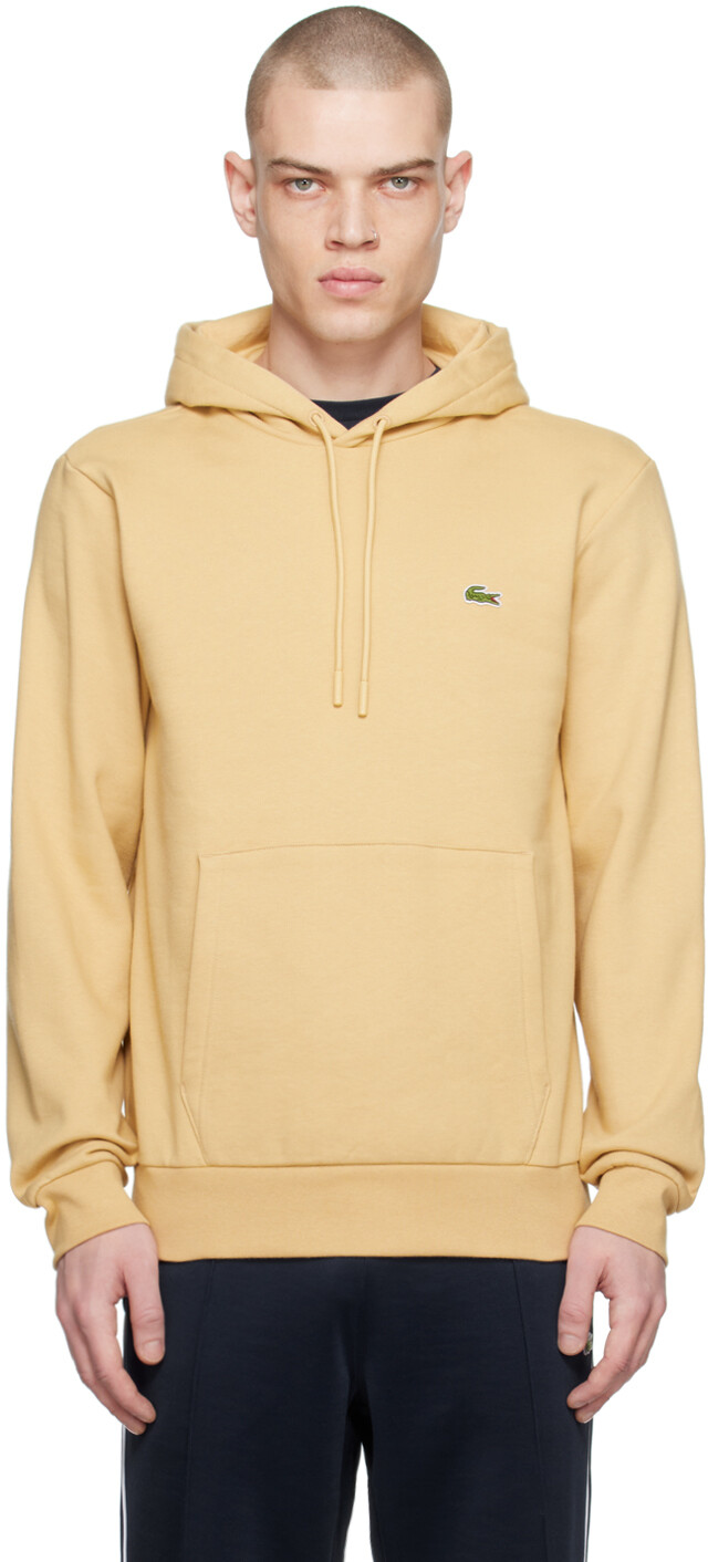 

Бежевый худи с нашивками Lacoste