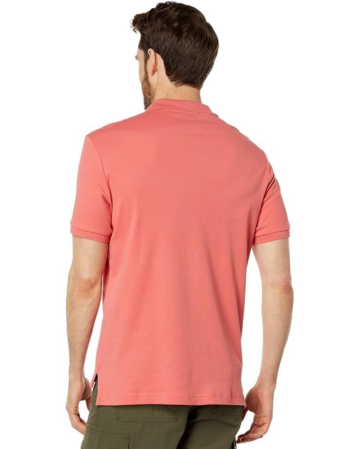 цена Поло U.S. POLO ASSN. Solid Interlock Polo, цвет Coral Fins