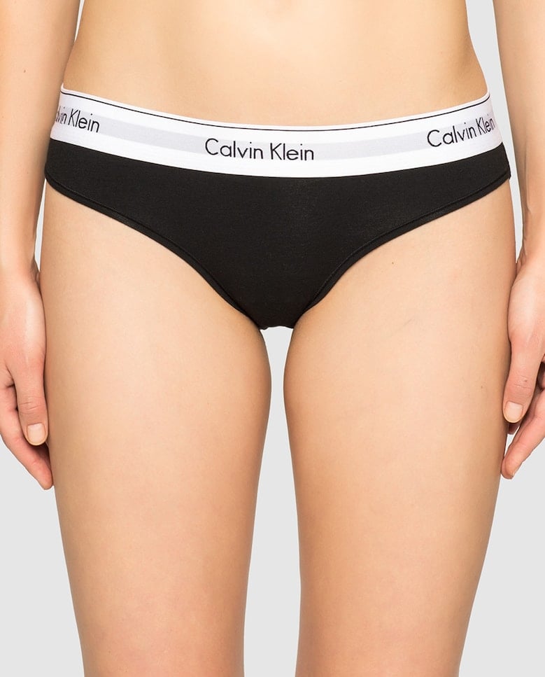 

Женские хлопковые трусики Calvin Klein с однотонным вырезом бикини Calvin Klein, черный