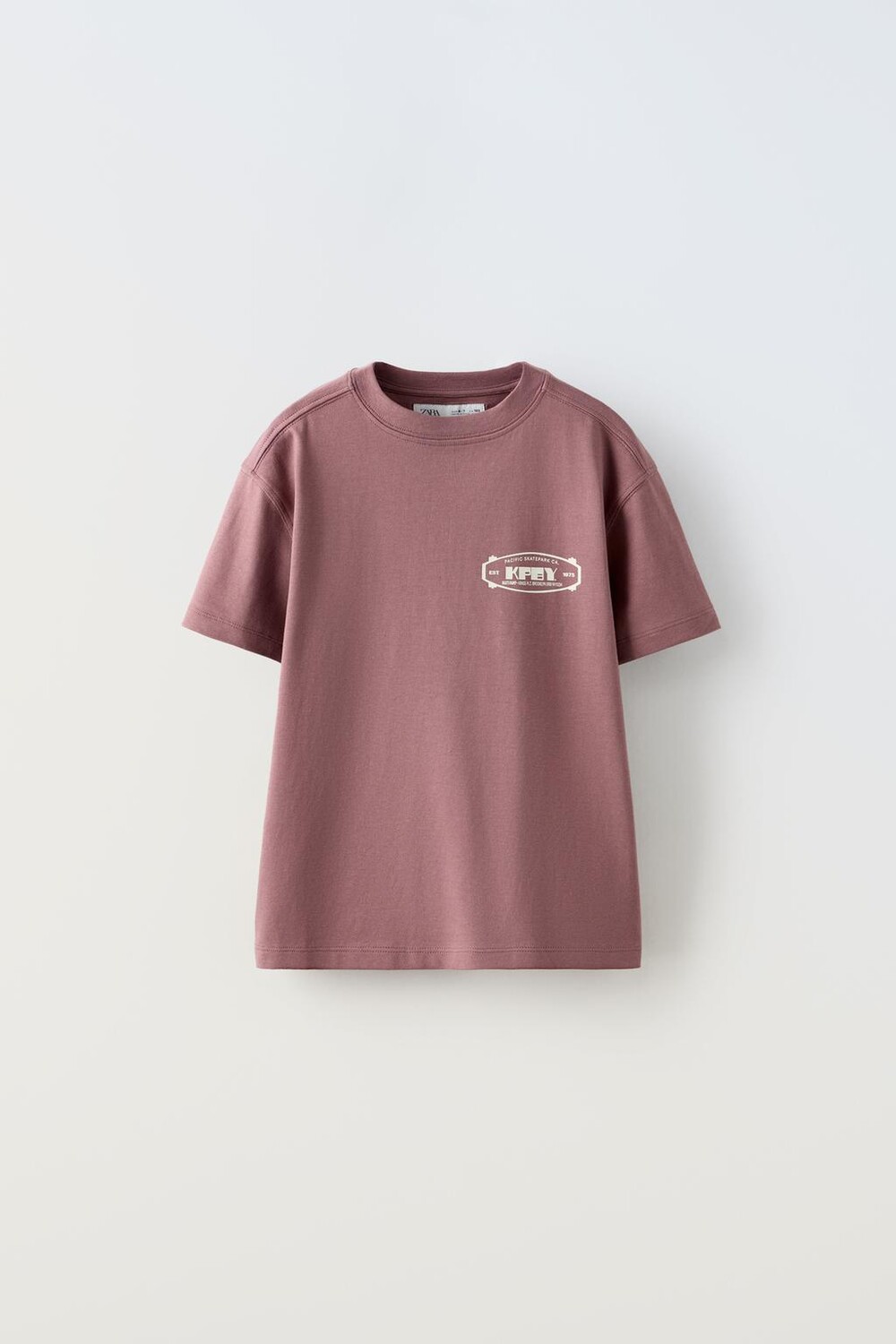 

Футболка с принтом логотипа ZARA, розовый/лиловый