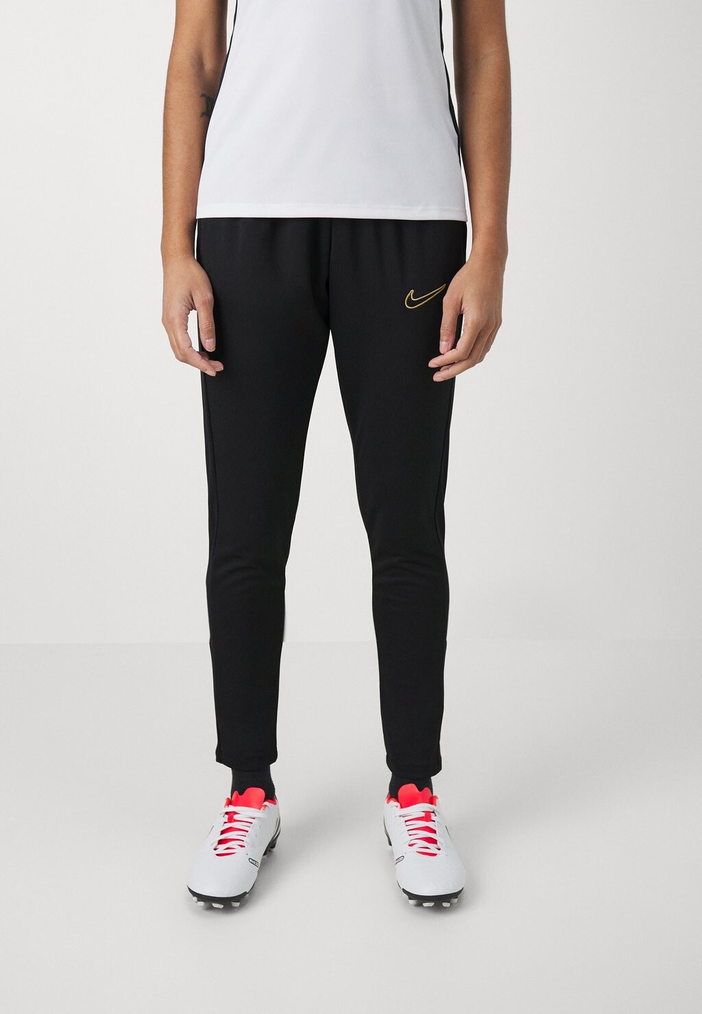 

Брюки для бега ACADEMY PANT Nike, цвет black/metallic gold