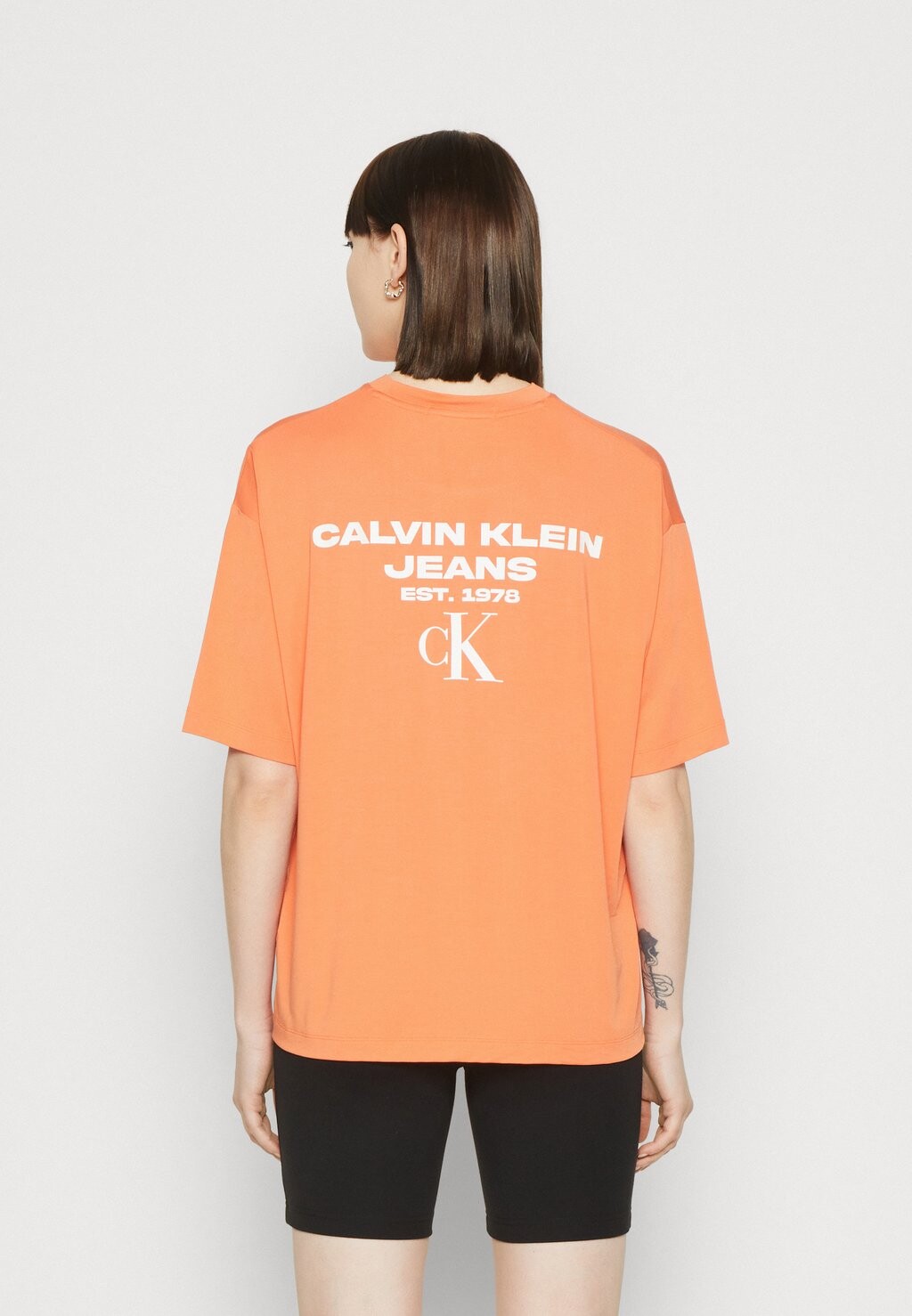 

Футболка с принтом Calvin Klein Jeans, Оранжевый