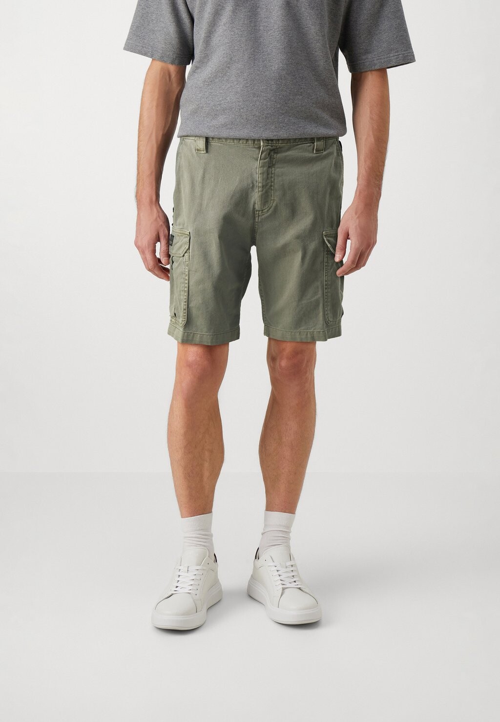 

Джинсовые шорты ETHAN Tommy Jeans, оливковый