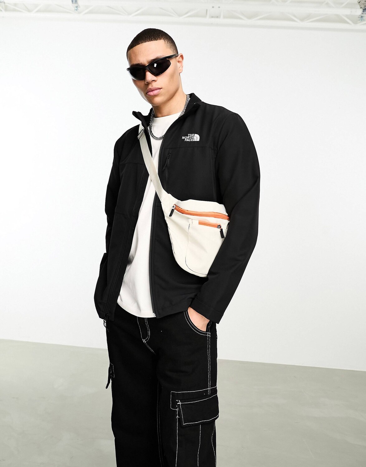 

Черная складная водоотталкивающая дорожная куртка The North Face Softshell