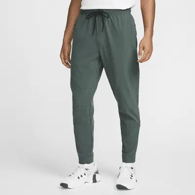 

Брюки Nike Unlimited, цвет Vintage Green/Black/Vintage Green