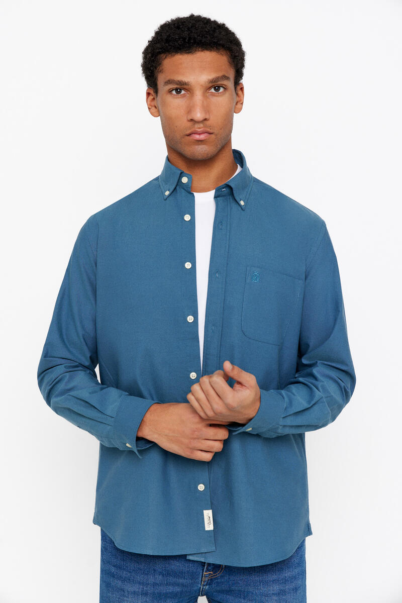 цена Однотонная оксфордская рубашка Cortefiel, синий