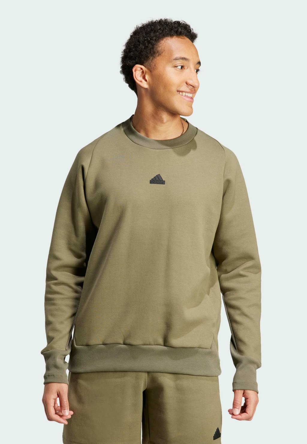 

Толстовка adidas Sportswear З.Н.Е. ПРЕМИУМ, цвет olive strata