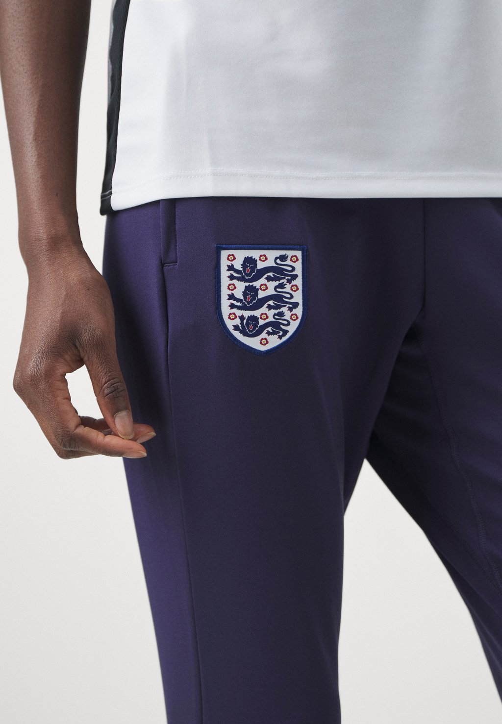 

Низ спортивного костюма England Strike Pant Nike, чернильно-фиолетовый/палисандр/белый