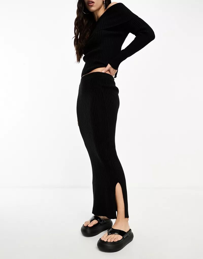 Черная трикотажная юбка макси с боковым разрезом Kaiia цена и фото