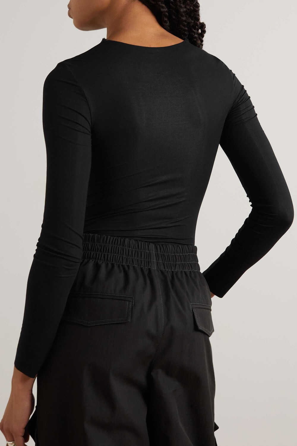 

WOLFORD + Боди N°21 Bonnie из эластичного мода с вырезами и рюшами, черный