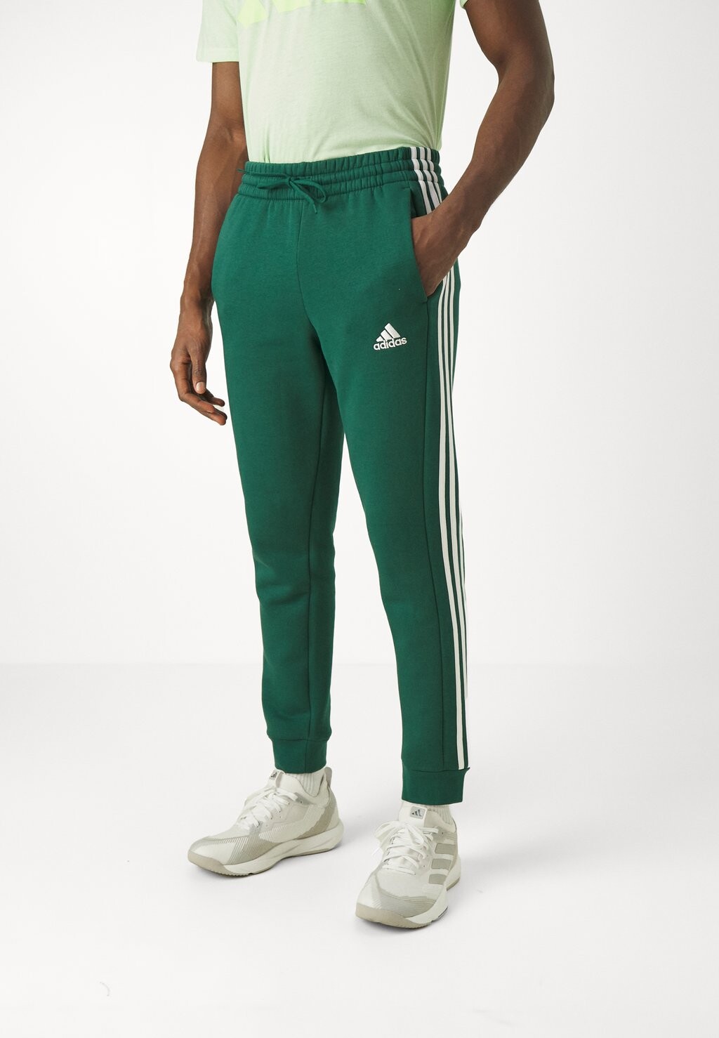 

Спортивные брюки Essentials Tapered Cuff Pants adidas Sportswear, цвет collegiate green