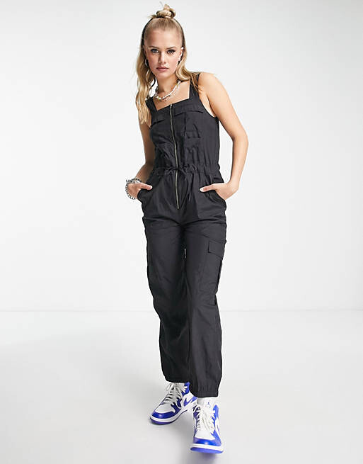 

Черный комбинезон с карманами COLLUSION