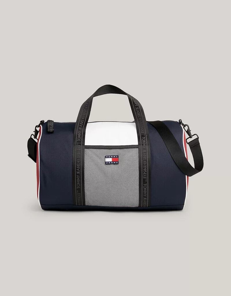 

Синяя дорожная сумка Tommy Jeans с сетчатым карманом
