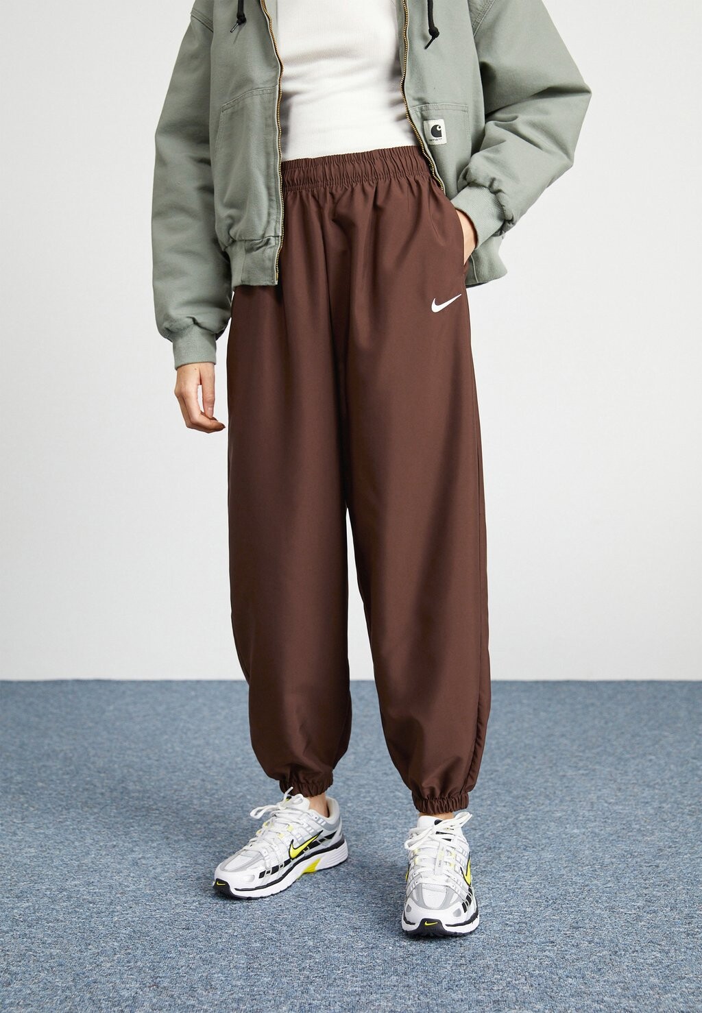 

Спортивные штаны TREND Nike Sportswear, цвет earth