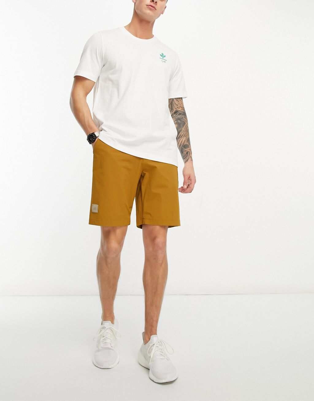 

Светло-коричневые шорты adidas Golf Adicross
