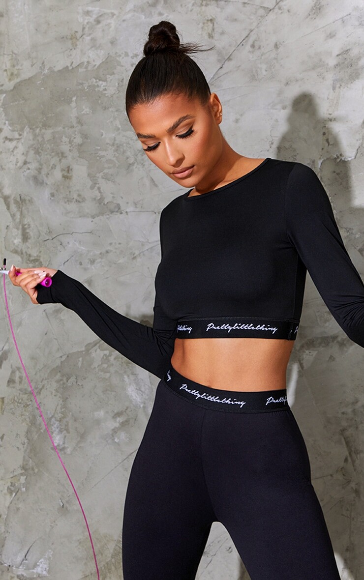 

PrettyLittleThing Черный укороченный топ с длинными рукавами и полосой