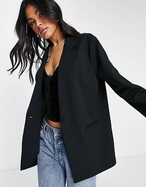 

Черный трикотажный пиджак с напуском ASOS DESIGN