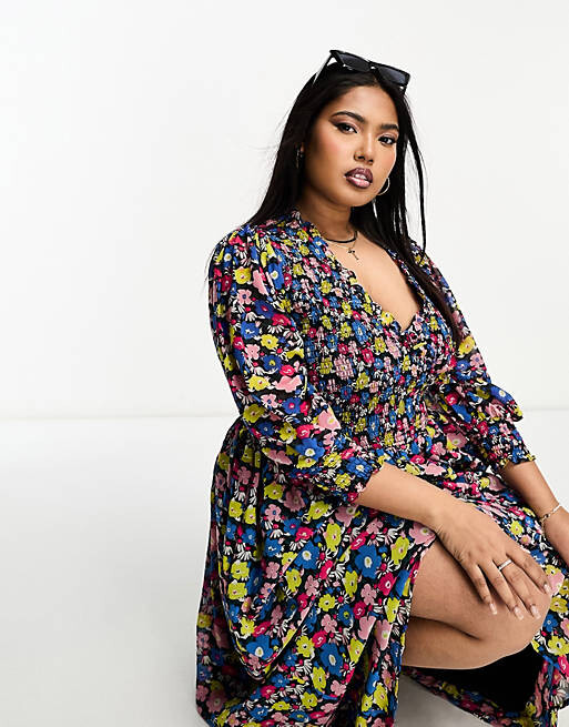 

Черное свободное платье миди с присборенными манжетами ASOS DESIGN Curve с разноцветным цветочным принтом, Черный