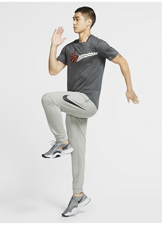 Однотонные серые мужские спортивные штаны с нормальной талией Nike