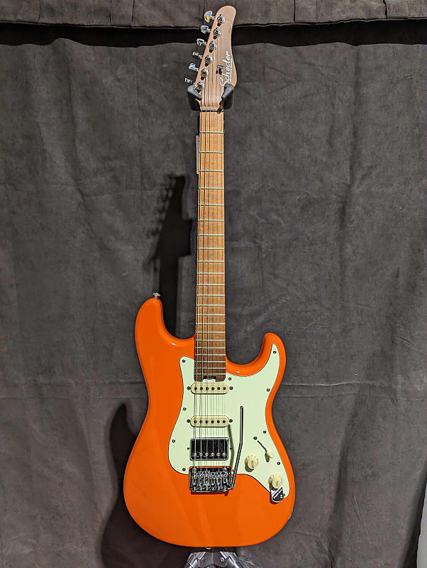 

Электрогитара Schecter Nick Johnston Signature Traditional HSS Atomic Orange Electric Guitar