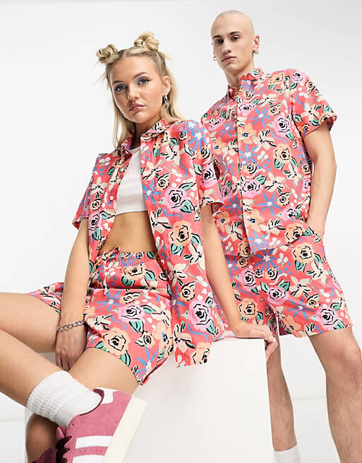 

Рубашка унисекс с короткими рукавами и розовым принтом ASOS MADE IN KENYA