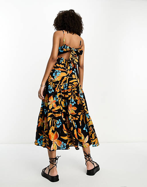 

Черное пляжное платье макси с тропическим принтом River Island