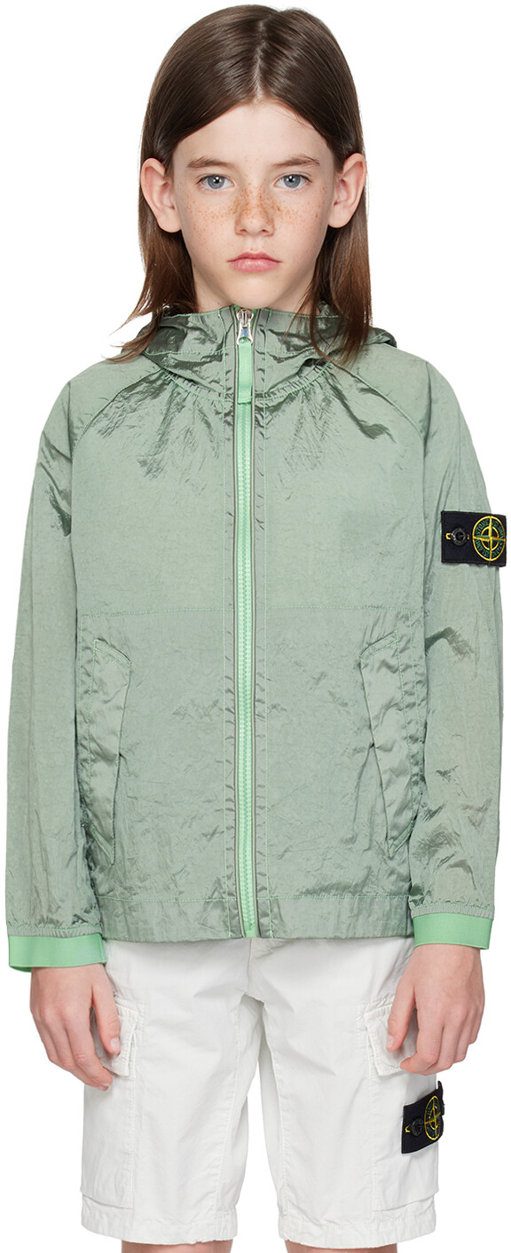 

Детская зеленая куртка с нашивками Stone Island Junior