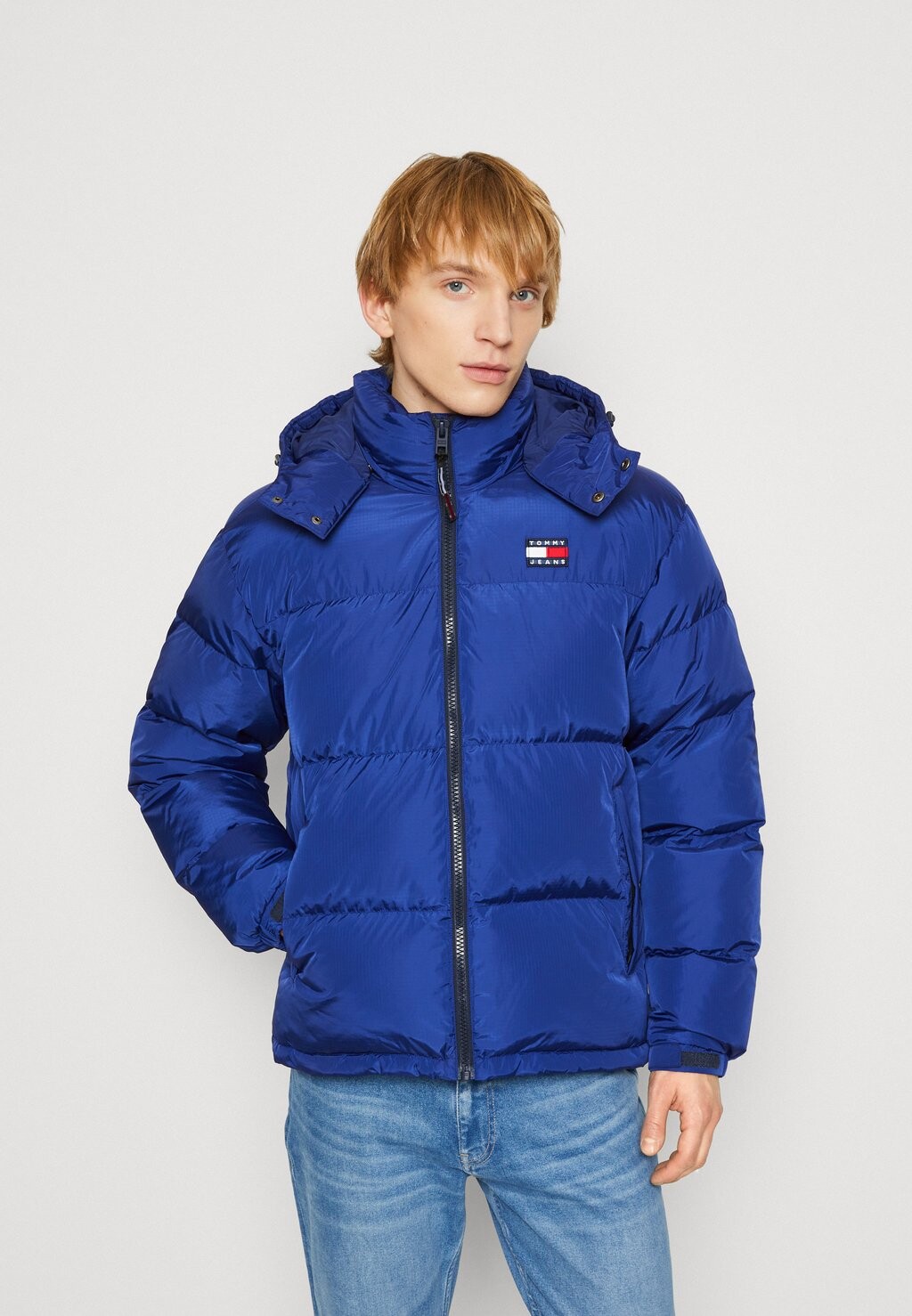 

Пуховик Tommy Jeans, темно-синий