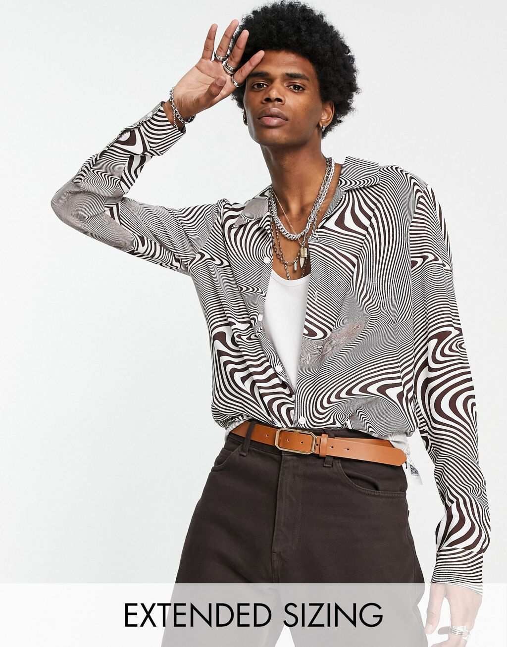 

Коричневая рубашка с деформированным принтом ASOS DESIGN 70s revere