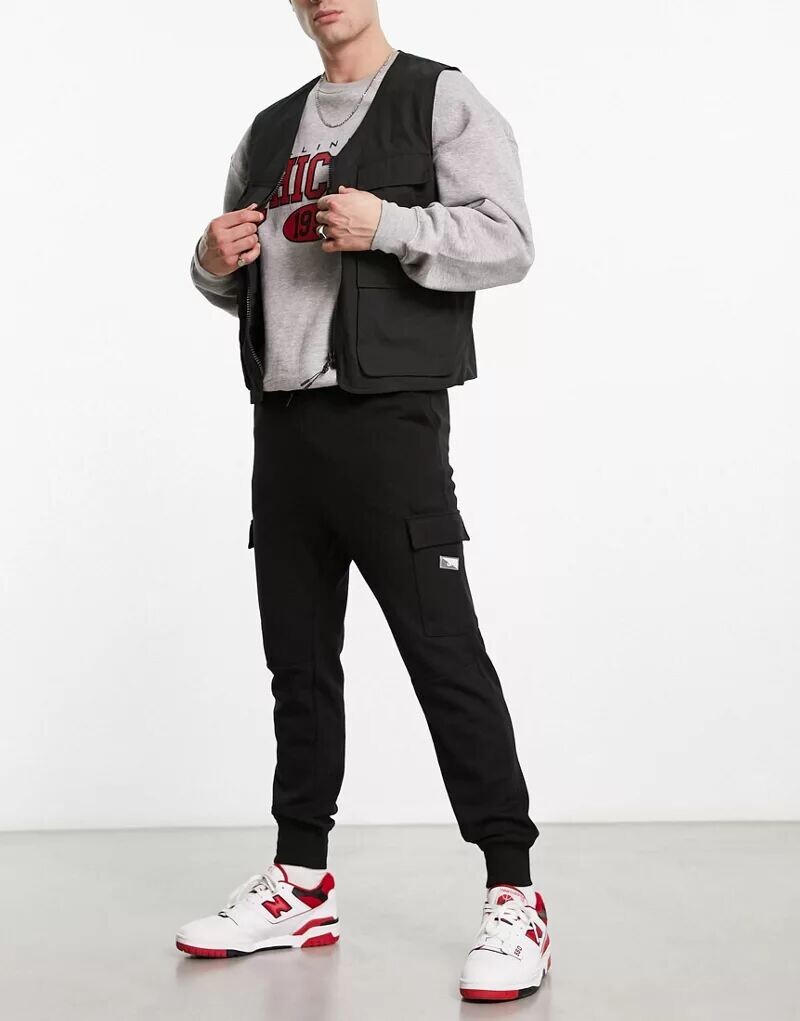 

Черные функциональные спортивные брюки с карманами Jack & Jones Intelligence