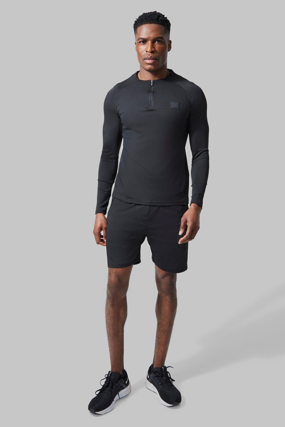 

Короткий спортивный костюм мужской active с круглым вырезом на молнии 1/4 Boohoo, черный