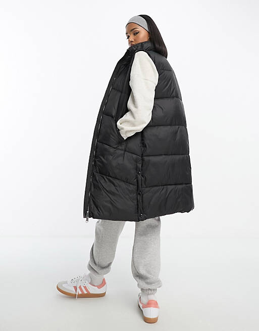 

Черный удлиненный дутый жилет Vero Moda