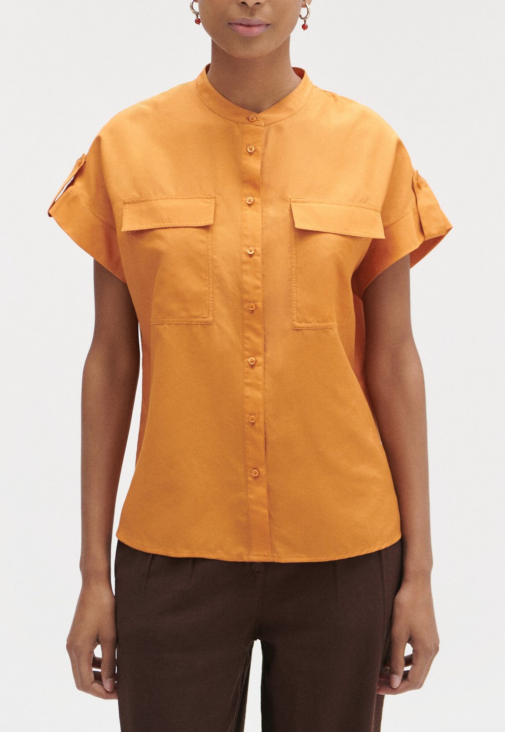 цена Рубашка Caroll, светло-оранжевый
