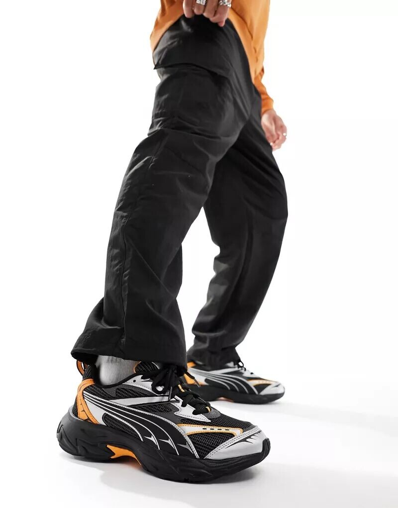 

Черно-оранжевые кроссовки PUMA Morphic
