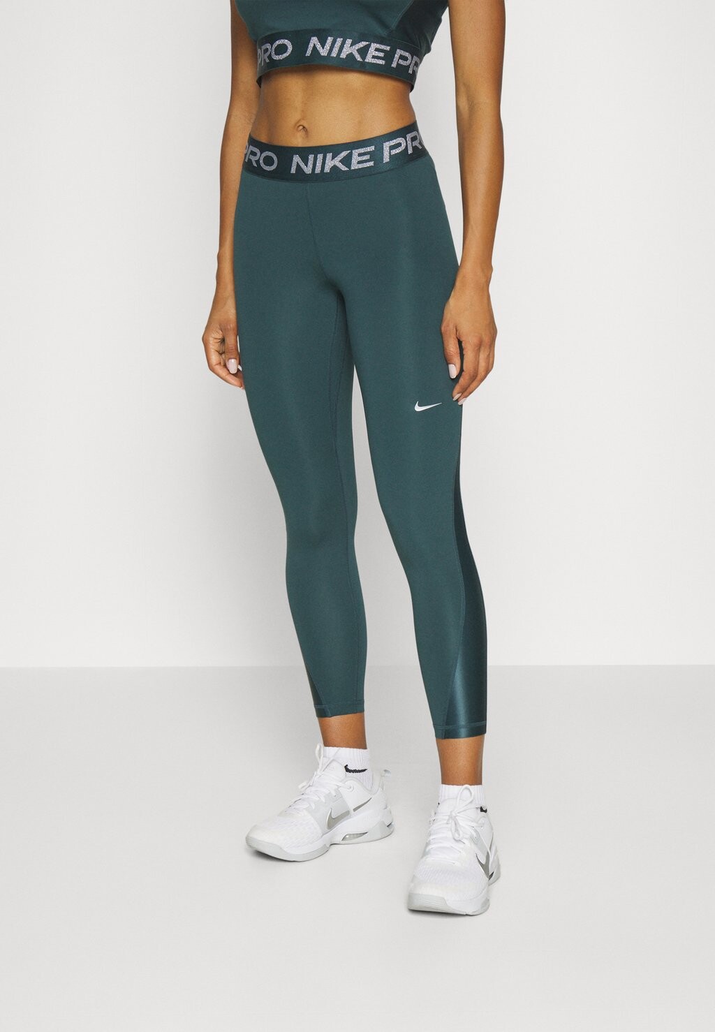 

Колготки 7/8 SHINE Nike, глубокие джунгли/серебристый