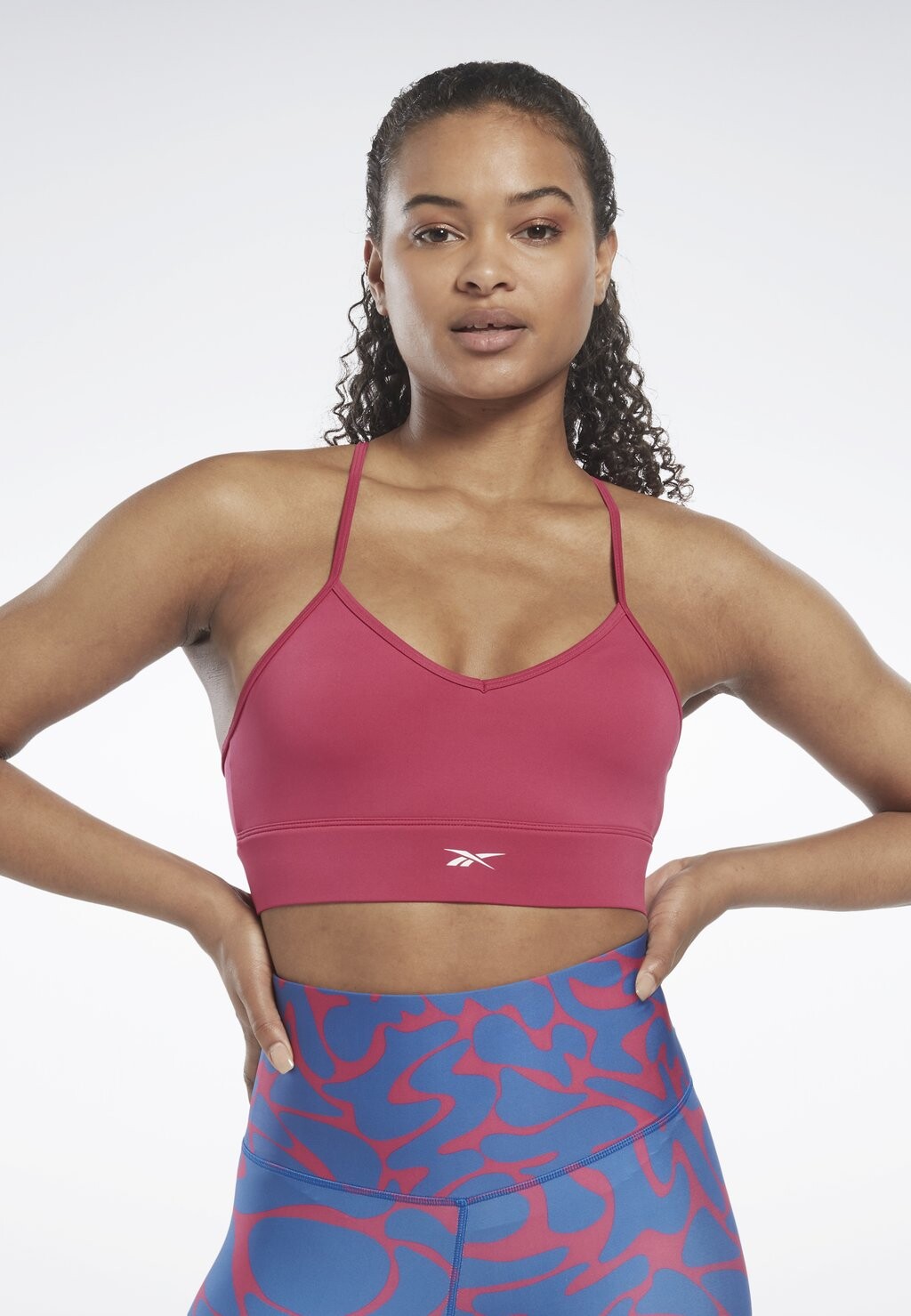 

Спортивный бюстгальтер с легкой поддержкой TRAIN Reebok, цвет semi proud pink