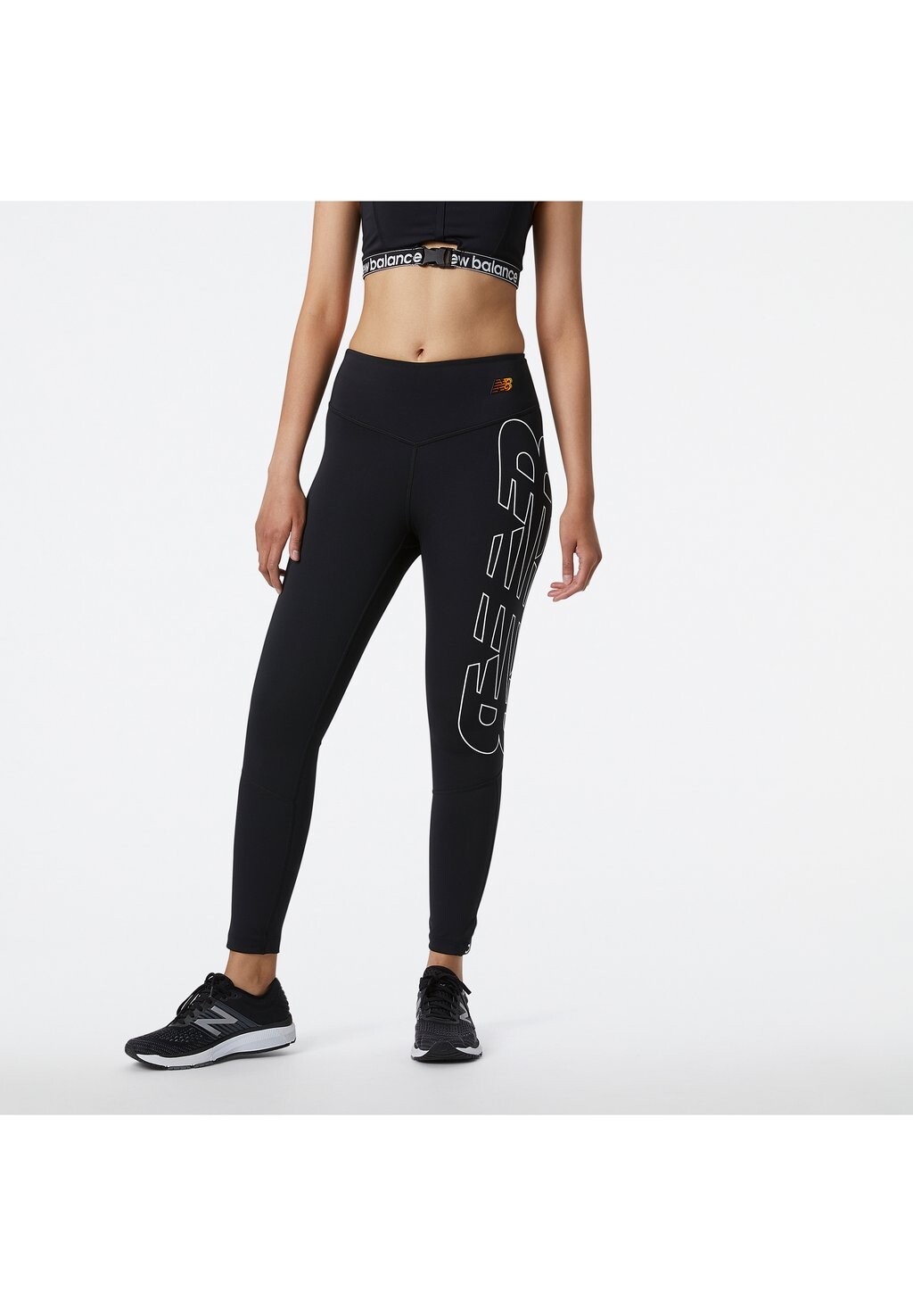 

Тайтсы New Balance, черный