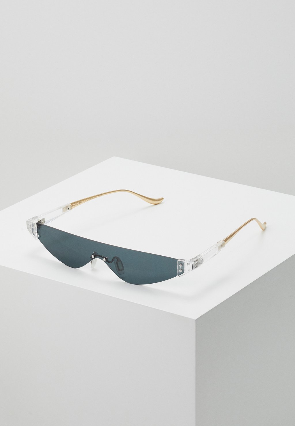 цена Солнцезащитные очки SUNGLASSES VALENCIA Urban Classics, цвет transparent/gold-coloured