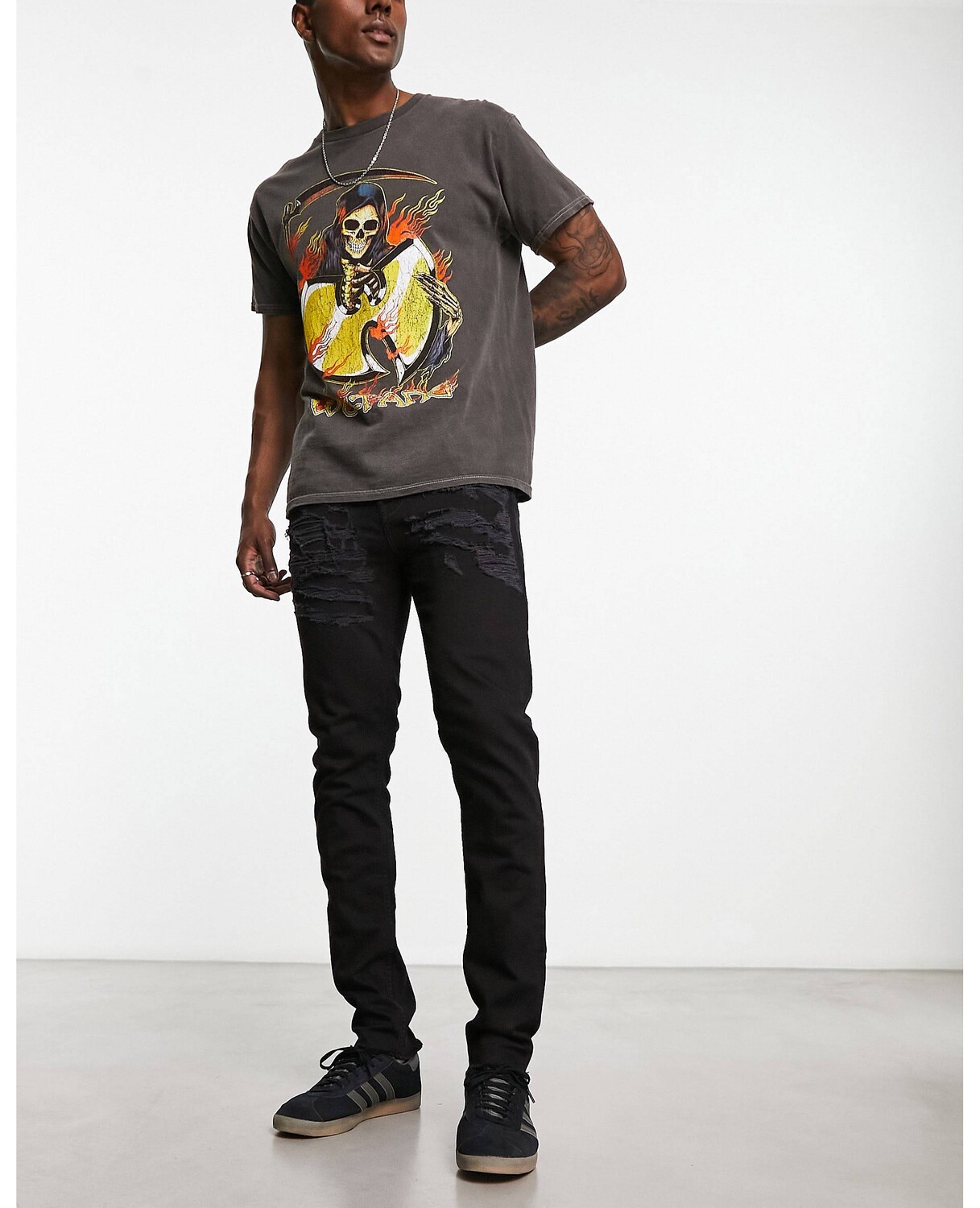

Черные джинсы скинни с эффектом потертости ASOS DESIGN
