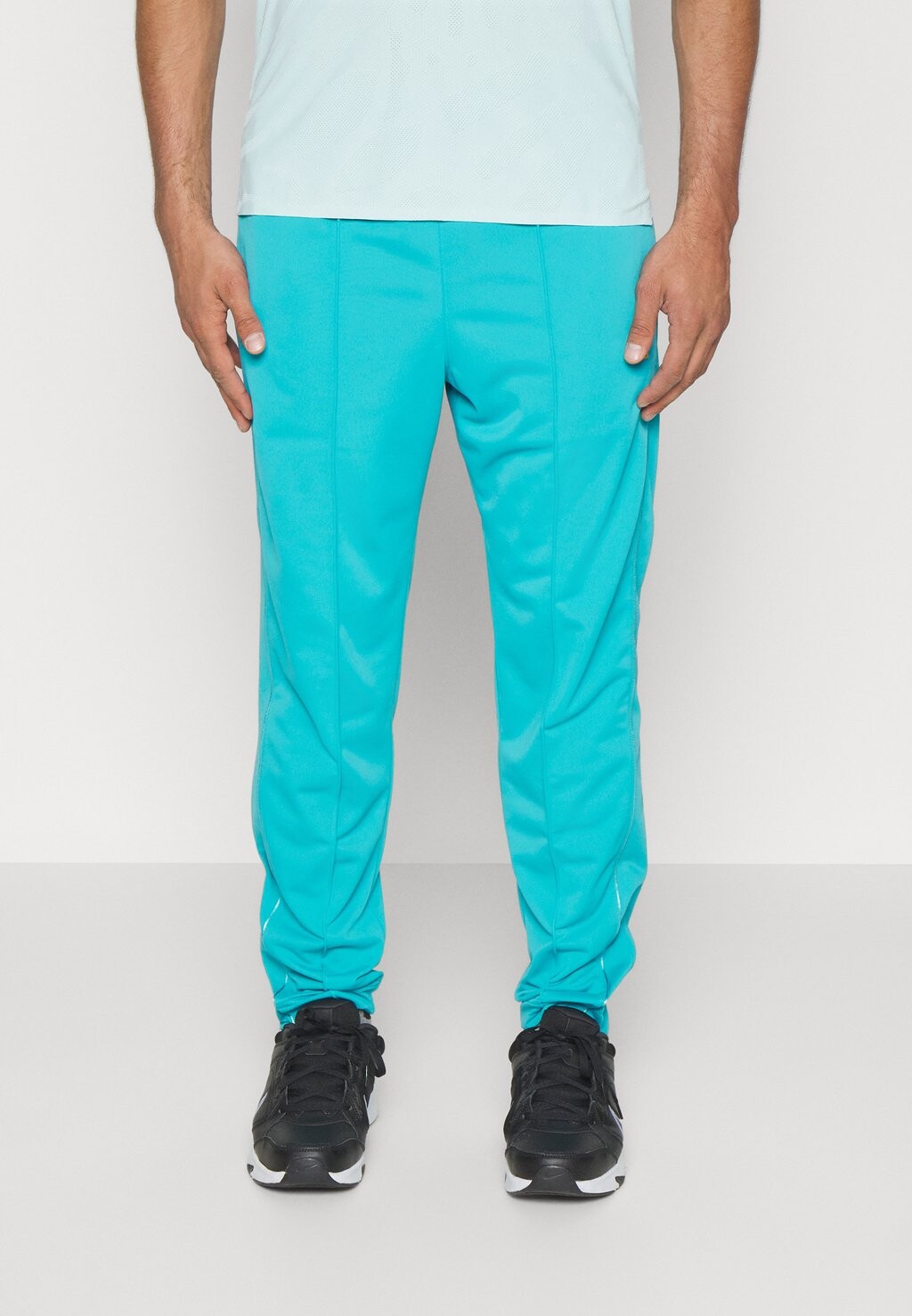 

Спортивные брюки HERITAGE PANT Nike, бирюзовый