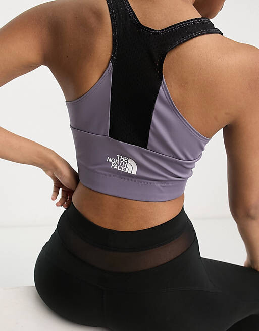 

Фиолетовый топ без рукавов The North Face Mountain Athletic