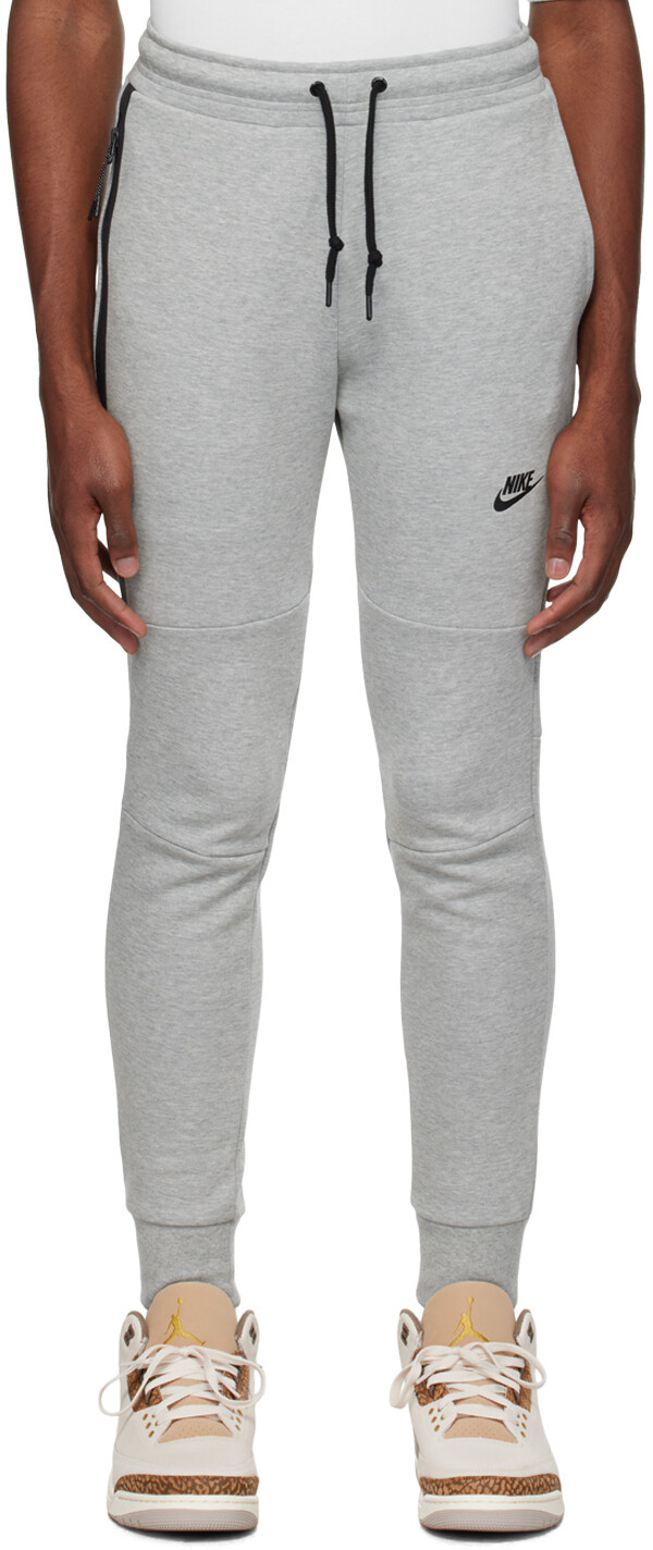 

Серые спортивные штаны на кулиске Nike